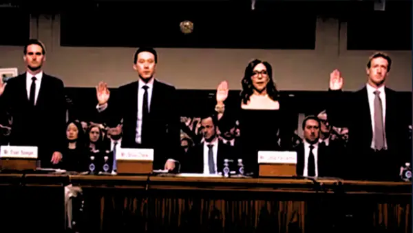 Sidang Senat AS pada 31 Januari 2024, di bawah tekanan tajam dari para senator Mark Zuckerberg (sebelah kanan) dipaksa berdiri dan minta maaf atas algoritma vulgar Instagram. (Sumber : Tangkapan Layar WCVB  Chanel 5 Youtube.com)