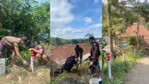 Pemasangan reflektor jalan oleh Mahasiswa KKN Kelompok 35 Nusa Putra University (NPU) di Desa Margalaksana. (Sumber Foto: Dok. KKN NPU)