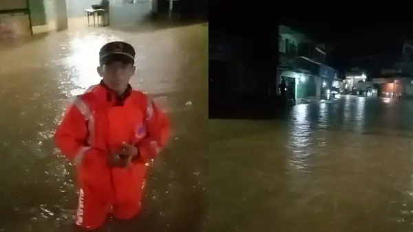 Petugas P2BK ditengah banjir akibat sungai meluap di Purabaya, Kabupaten Sukabumi | Foto : Dok. P2BK