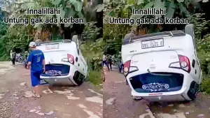 Penampakan mobil yang terbalik dalam kecelakaan tunggal di Jalan Cipetir, Kadudampit, Kabupaten Sukabumi. Kamis (8/1/2025). (Sumber: Video tangkapan layar warga)