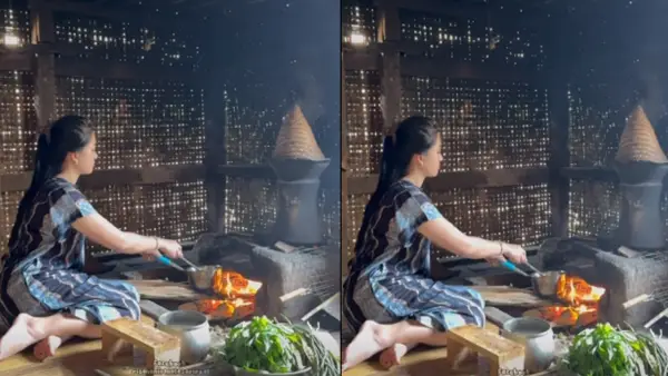 Seorang perempuan sedang memasak dengan menggunakan bahan bakar kayu | Foto : @Risma Nirmalasari