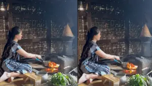 Seorang perempuan sedang memasak dengan menggunakan bahan bakar kayu | Foto : @Risma Nirmalasari