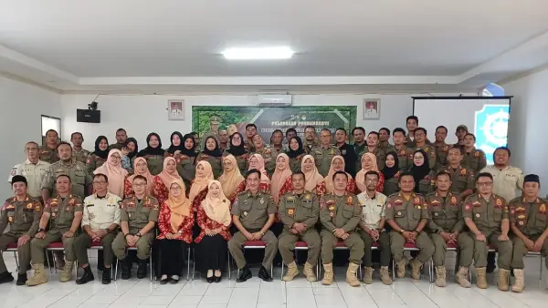 Pelepasan purnatuguas, Akhmad Riyadi di Aula SAtpol-PP Sukabumi pada Minggu (1/2/2026). (Sumber: Istimewa)