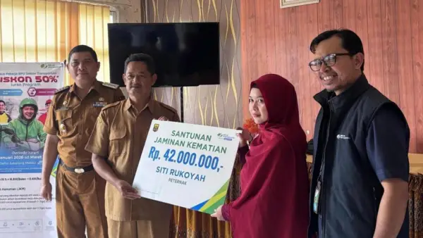 Sosialisasi program jaminan sosial ketenagakerjaan sekaligus penyerahan santunan di Aula Kecamatan Cibitung, Kabupaten Sukabumi, Selasa (3/3/2026). (Sumber: Istimewa)