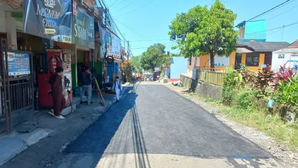 Kondisi Jalan Babakanjaya–Bojonglongok di wilayah Kecamatan Parungkuda, Kabupaten Sukabumi setelah diperbaiki. (Sumber: Istimewa)