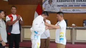 Wabup Andreas saat melepas kontingen Kabupaten Sukabumi untuk berlaga di kejuaraan POPWILDA Jabar 2026. (Sumber: Dokpim)