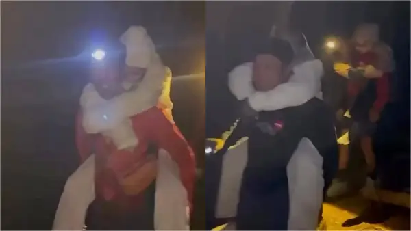 Tangkapan layar video viral pendaki tektok Gunung Gede dievakuasi petugas dengan cara digendong. (Sumber Foto: IG Infojawabarat)