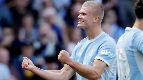 Selebrasi Erling Haaland saat mencetak gol ke gawang Conventry City (Sumber: web/reuteus.com)