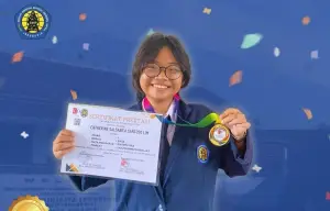 Catherine berhasil meraih Juara 1 sekaligus menyabet medali emas mata pelajaran Matematika tingkat SMA/MA/SMK sederajat dalam Olimpiade Unggul USU ke-11 Internasional. (Sumber Foto: IG smkparindo.official)